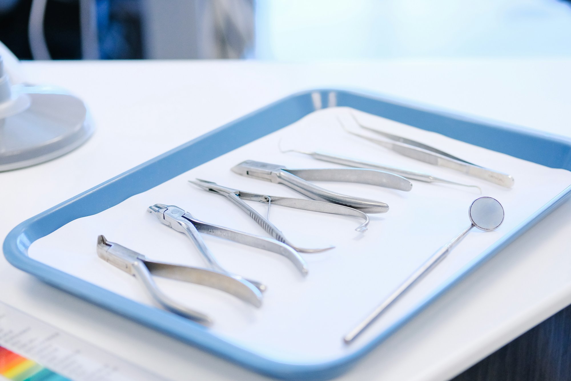 Sterile dental instruments prepared on a tray — tooth extraction at Dr Pierre Dentistry Edgecliff